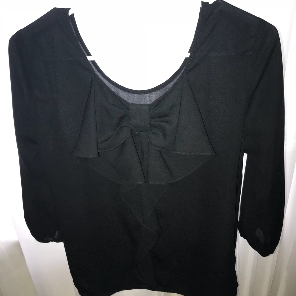 black limited shirt, with bow in the back. size s
